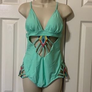 Unique Mint green one piece bathing suit with peep-hip & open sternum straps Med